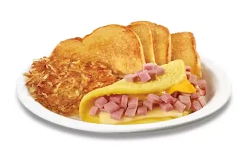 Denny’s Build Your Own Omelette with customizable fillings, served with golden hash browns and buttered toast.