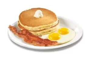 Denny’s Everyday Value Slam with pancakes, eggs, bacon, and sausage at a budget price.