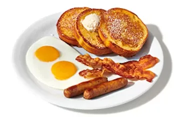 Denny’s French Toast Slam with thick slices of French toast, eggs, bacon, and sausage links.