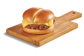 Denny’s Jr. Cheeseburger with a beef patty, melted cheese, and bun, served for kids.