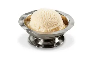 Denny’s Jr. Ice Cream scoop served in a small silver dessert dish.