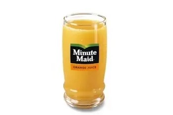 Denny’s Minute Maid juice served chilled in a glass.