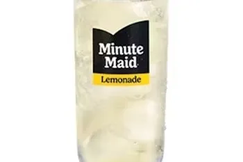 Denny’s Minute Maid Lemonade served with ice in a clear glass.
