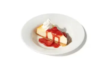 Denny’s classic New York style cheesecake slice served plain.