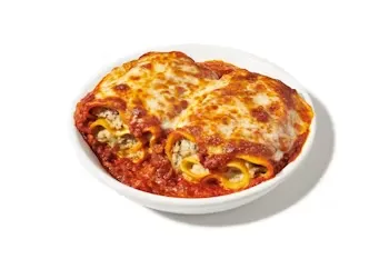 Denny’s Oven-Baked Lasagna layered with pasta, meat sauce, melted cheese, and herbs.