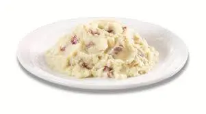 Denny’s red rustic mashed potatoes served creamy and warm.