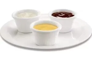Denny’s sauces and dressings served in small cups for dipping.
