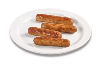 Denny’s breakfast sausages grilled and served on a white plate.