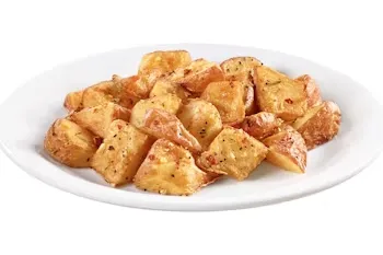 Denny’s seasoned red-skinned breakfast potatoes roasted golden brown.