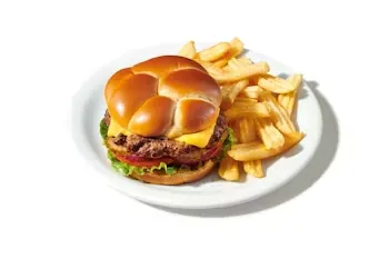 Denny’s Single Cheeseburger with beef patty, melted cheese, lettuce, tomato, and pickles.