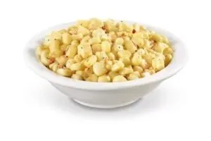 Denny’s sweet corn kernels served warm on a plate.